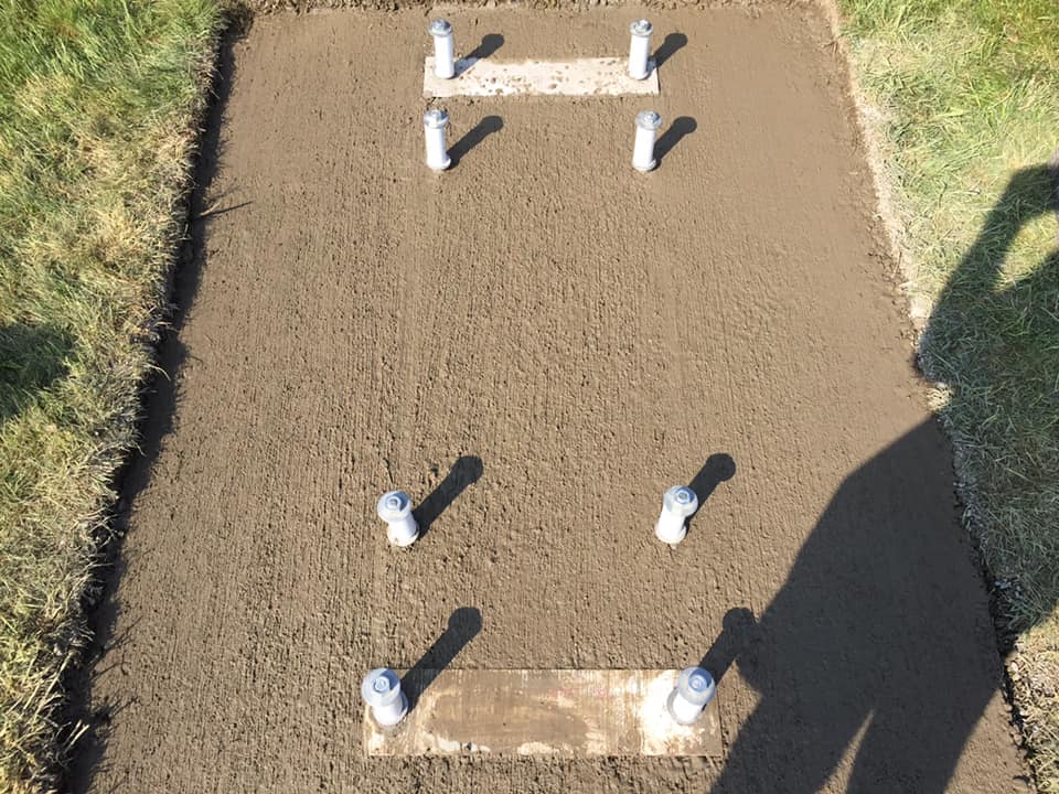 Install Concrete Base for New Retail Sign