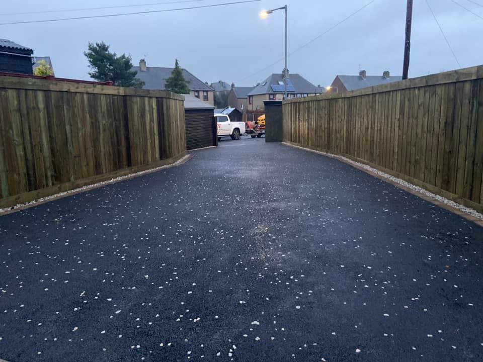 Retaining Wall, New Fence, Edging, Drainage & Tarmac Drive