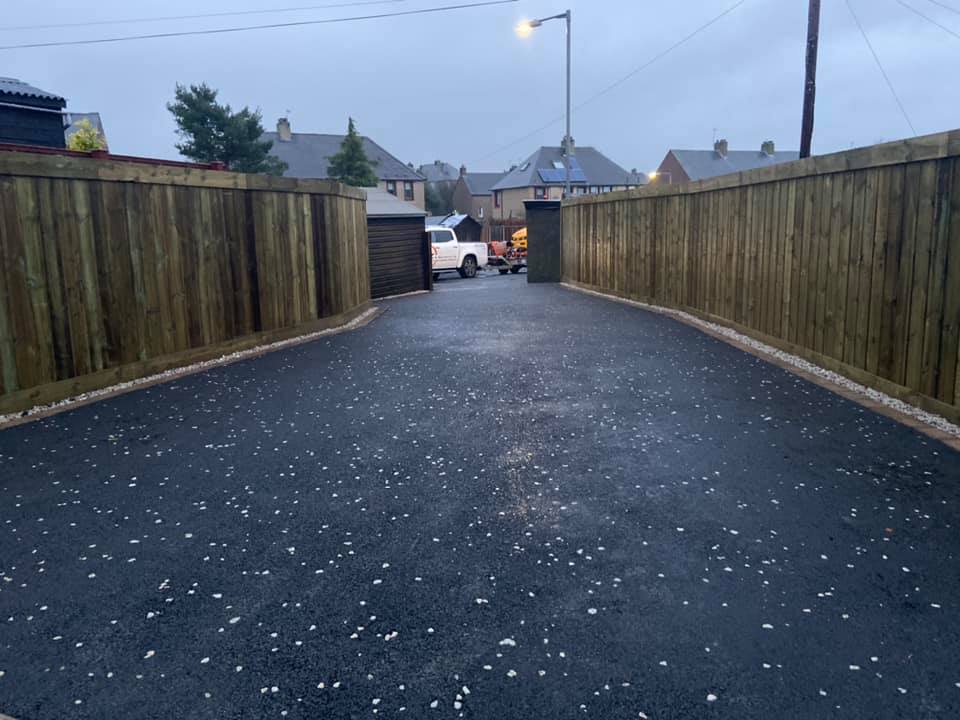 Retaining Wall, New Fence, Edging, Drainage & Tarmac Drive