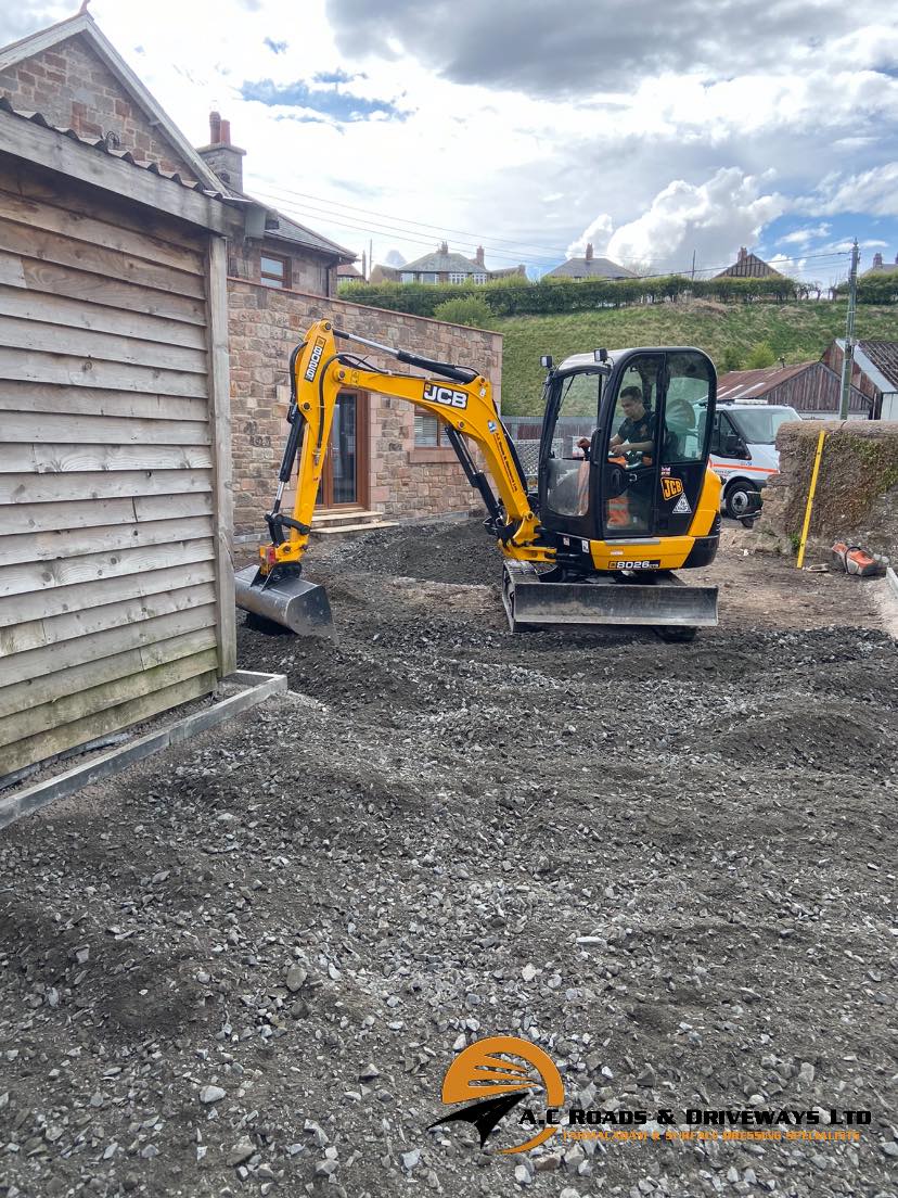 Tarmac Driveway with Drainage, Kerbing and Manhole Covers