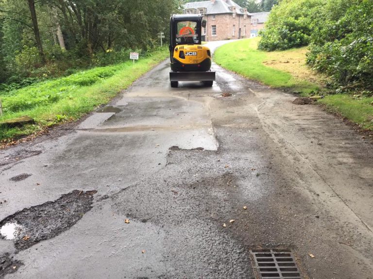 Resurfacing road repair works Mertoun House for Duke of Sutherland