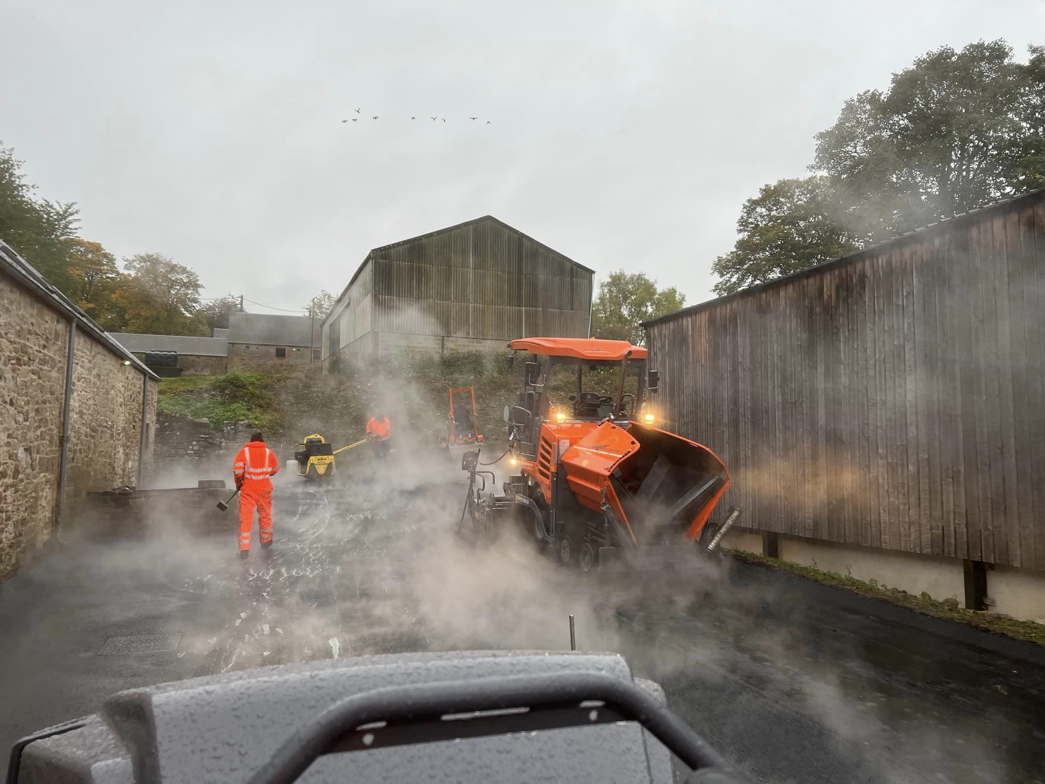 base course tarmac and stone mastic asphalt is then laid, rolled and sealed_1