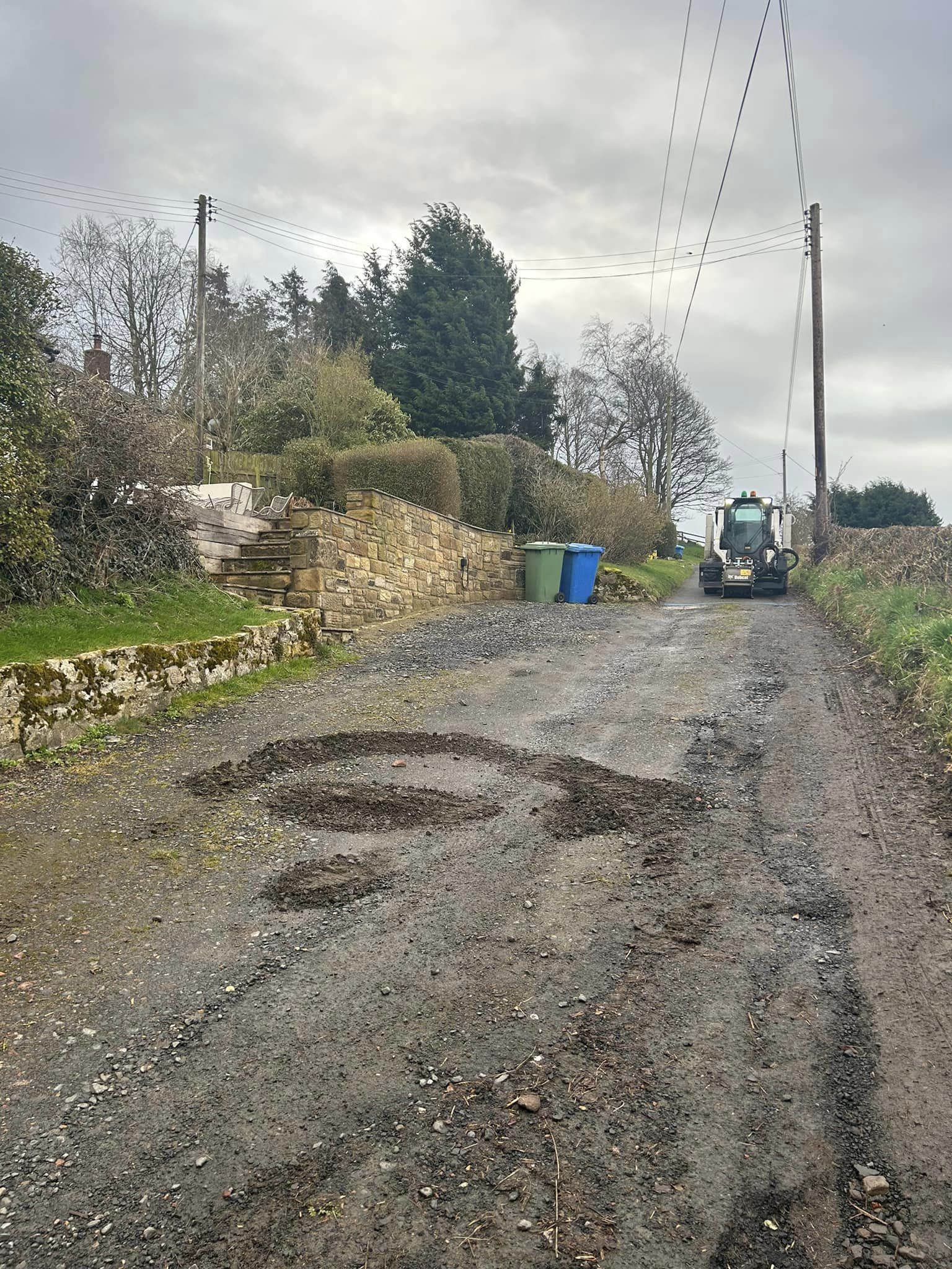 excavate and remove old access road