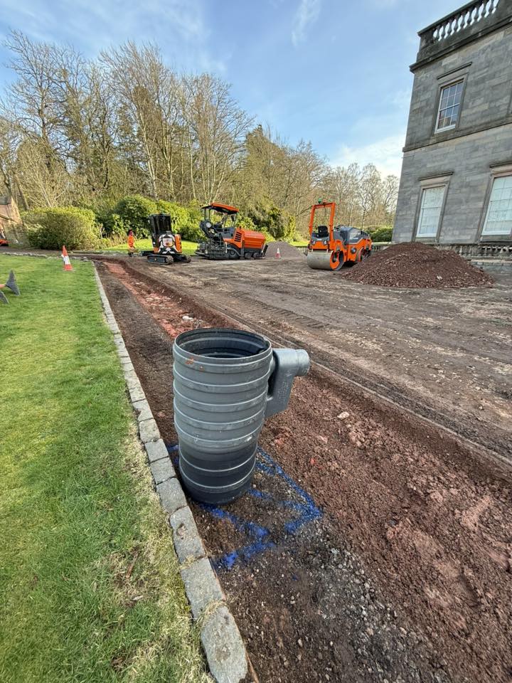 Reducing levels to improve drainage flow - Installing a new drainage system to effectively collect surface water