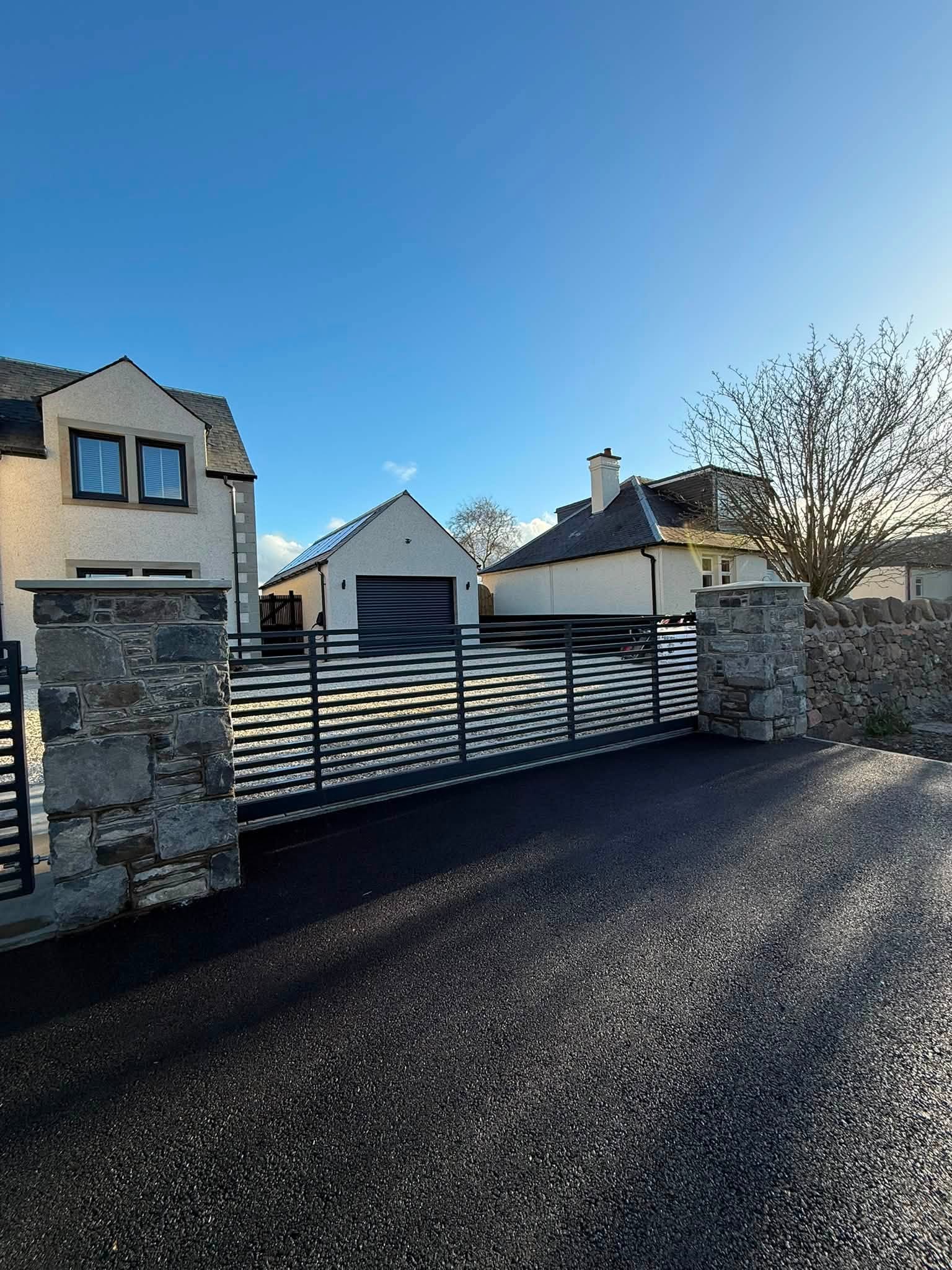 Tarmac Driveway with Dropped Kerb Access - Council Approved Contractor
